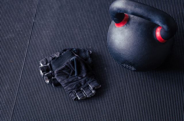 gym gloves on floor