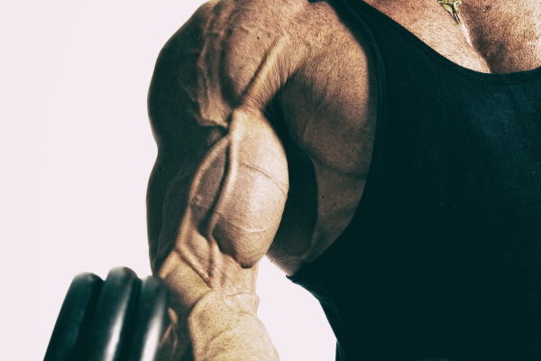 man building biceps muscles